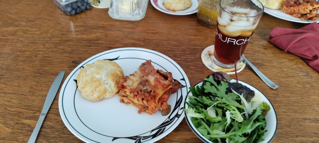 lasagna, salad, and sweet tea
